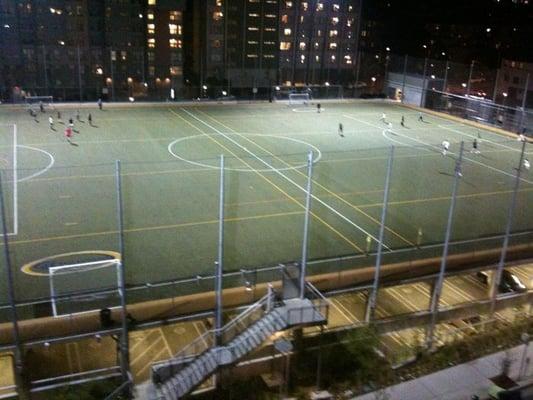 Turf field and parking underneath.