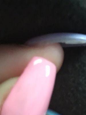 there's a piece of hair and one of my nails