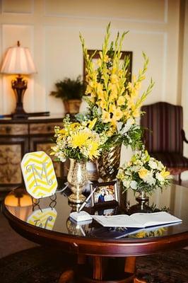 Foyer floral arrangements! The variation in height and types of flowers makes these work great!