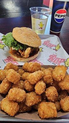 Chicken sandwich, tater tots, cold cider beer