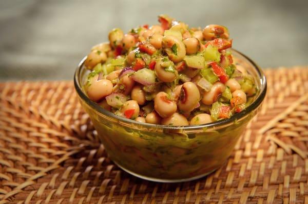 Side of cowboy caviar - black eyed pea salad tossed in a house-made cilantro lime vinaigrette