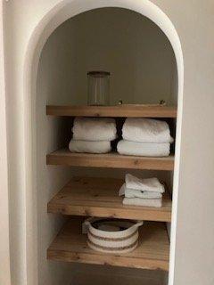 Custom shelves in bathroom