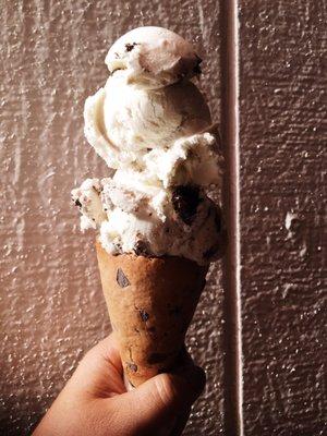 Homemade cookies & cream in a chocolate chip cookie cone.