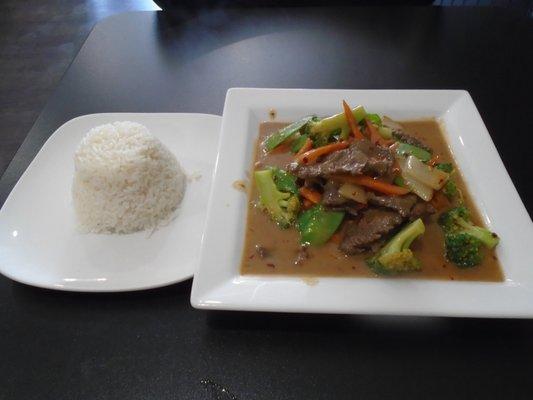 Thai peanut sauce stir fry with beef and rice.