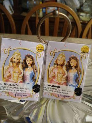 I'm not for sure those are some kind of cards is what I read but I have nine Barbies great condition they were wrapped