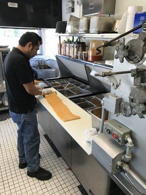 Rolling out dough to make my fresh empanadas ...!