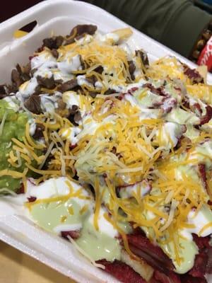 Half adobada, half carne asada fries. Yum!