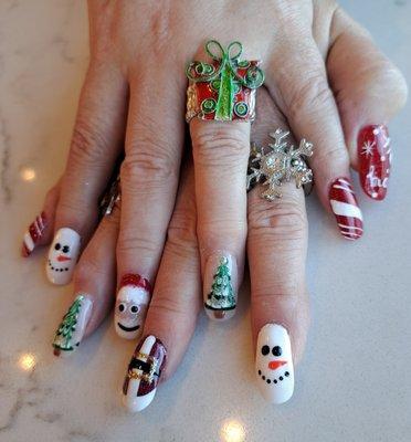 Lisa did a great job on my wife's nails. She is now ready for the holidays.