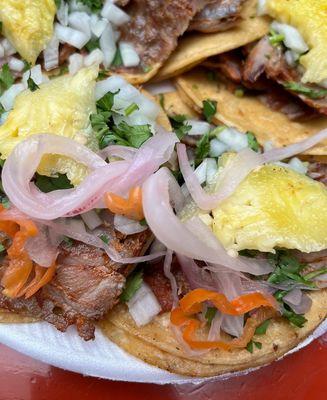 Tacos al pastor with habanero/pickled onions