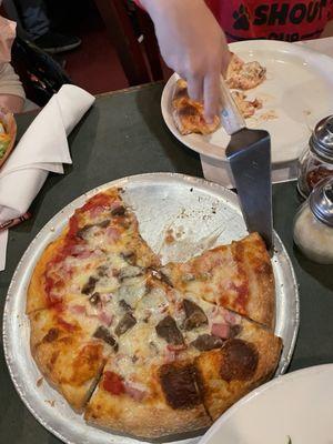 Kids 10 in pizza with meatballs and ham.