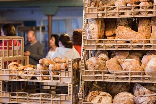 Fresh breads, and a tour in the background.