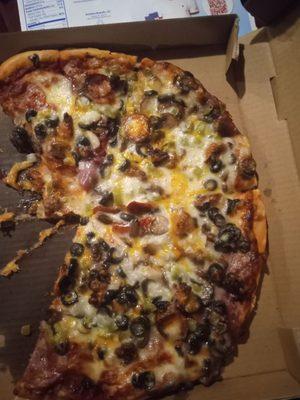 A pizza that wasn't made correctly more black olives and extra cheese then what we never ordered  This pizza was supposed to be a supreme