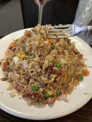 Pork fried rice. Delicious. Onions could be cooked a little more. Still delicious.