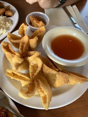 Crab rangoon and sample of firecracker chicken!