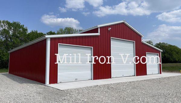 Red Carolina Barn that got put up by Holton, KS. Just gorgeous! All vertical metal on this steel structure! FREE install and delivery