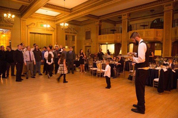 My husband about to shoot the garter with a rubber band gun