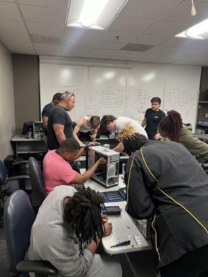 Students learning in hands-on labs as part of our CompTIA Career Development program