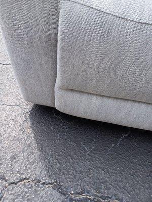 This loveseat had stains on it.