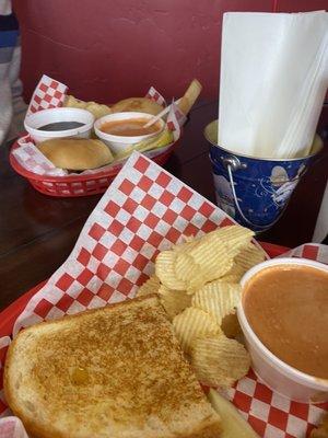 Grilled cheese with tomato soup.  French dip with tomato soup.