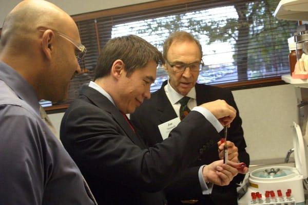 Dr. Nemeth demonstrating Protein Rich Fibrin to Dr. Frank McGeorge