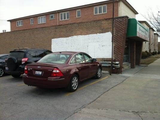 Parking along the side of the building.