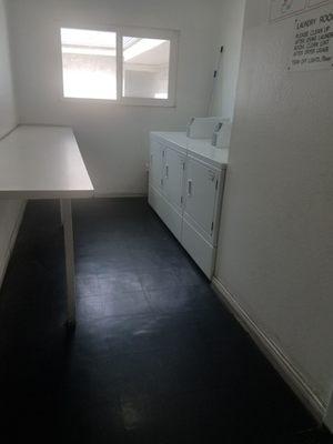 Apartment complex laundry room.