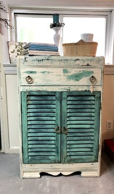 Chippy painted dresser with awesome old wooden shutters. Loving how it turned out.