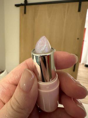 Glimmer Balm in Unicorn.  Cute.  Not glittery on your lips - just a slight shimmer with light color.