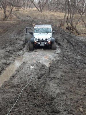 Recovered stuck jeep out of mud