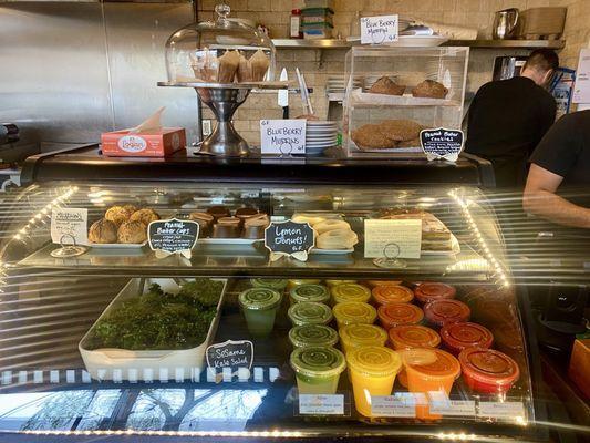 Front display case with gorgeous fresh juices and salads and homemade treats