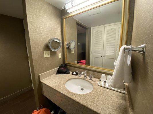 Vanity & sink right outside bathroom