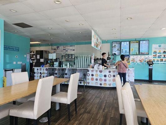 another view of the dining area and front counter