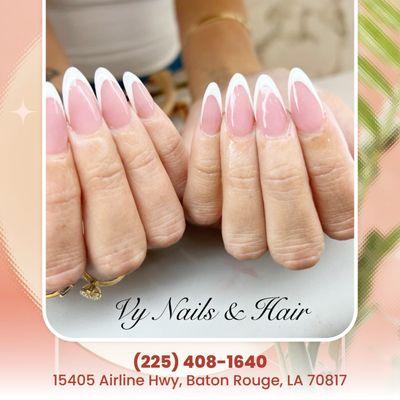 Step up your nail game with a soft pink base and pristine white French tips--because sophistication never goes out of style