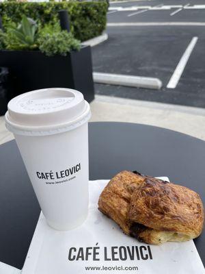 Vanilla latte and chocolate croissant warmed up. Yummy