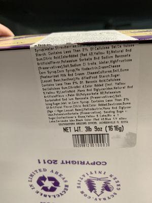 Bottom part of label - strawberries listed near the tear flanked by HFCS.