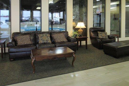 Spacious lobby overlooking the poolside area.