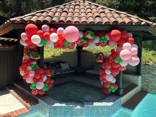 Strawberry balloon arch theme