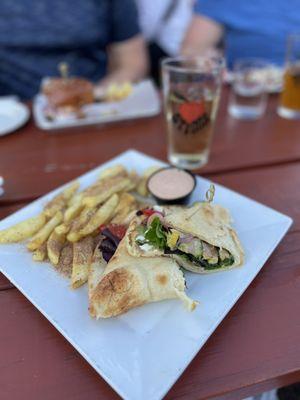 Roasted vegetable sandwich and house spicy fries