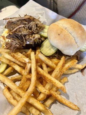 Baked potato and a pulled pork/hot link slider with fries (7.5-8/10 rating