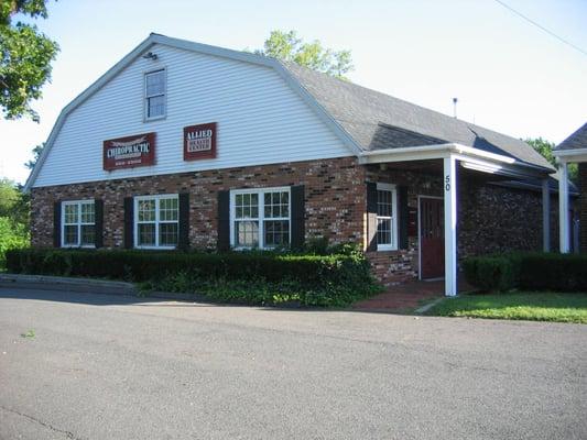 May Chiropractic & Laser Therapy located next to Proccinni's Restaurant