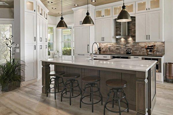 White Shaker Cabinets. Shown with glass inserts on the upper cabinets.