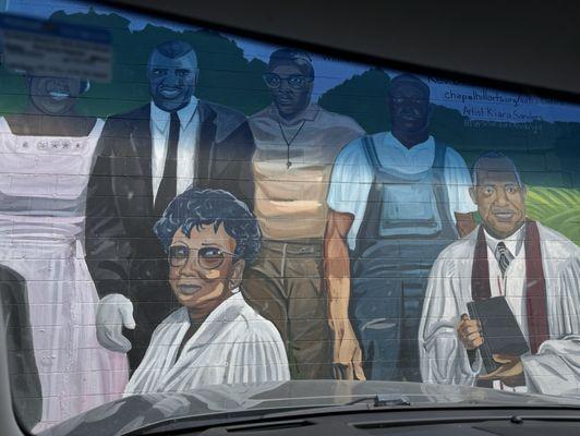 A tribute mural on the side of Walt's Grill, of several  notable Afro-Americans who were instrumental, pioneers in our country's history.