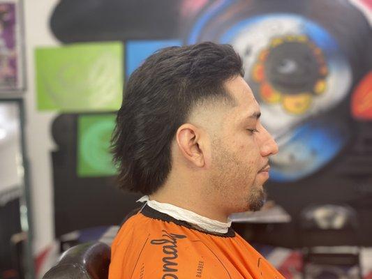 Taper mullet                                        http://erikthebarber2.booksy.com