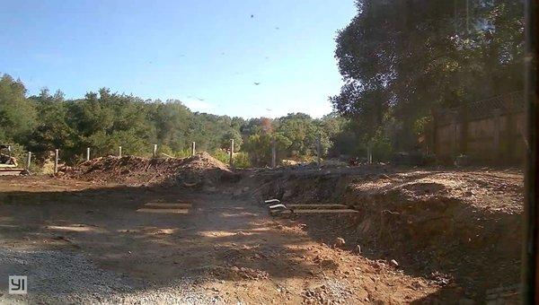 Our yard was almost completely made up of boulders.  We live on an old quarry, and they literally had to jackhammer up the whole area!