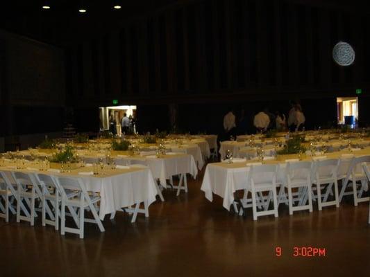 Hall with seating for 200, tables belong to church and chairs were rented (dance floor behind photographer)