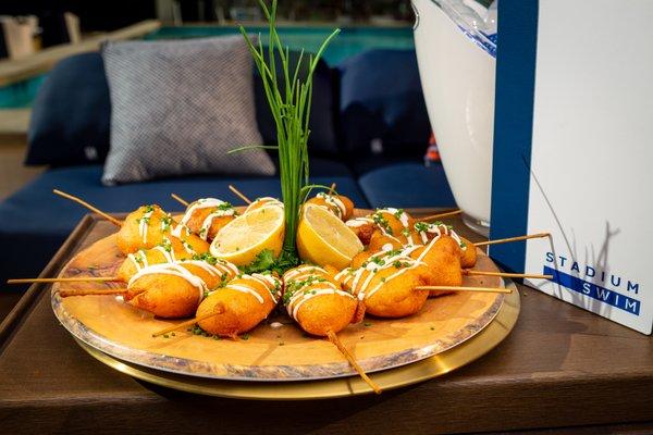 Lobster Corn Dogs - Lobster Tail with Crispy Cornbread Batter, served with Lemon Aioli