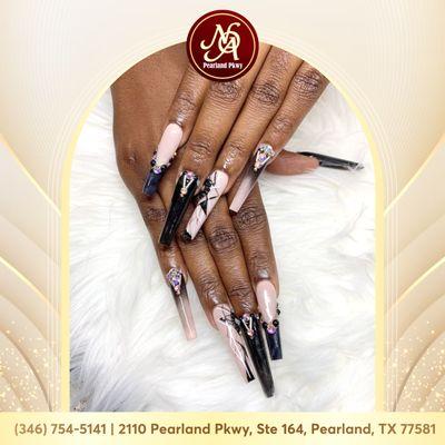 Step into confidence with our striking long coffin nails! Bold designs to match your bold spirit.