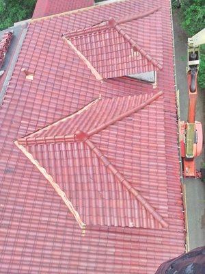 Terra Cotta Roof with Copper Valleys.