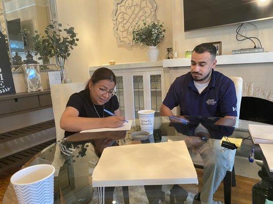 Loan docs being signed, this young couple are purchasing a home in covina. Thank you! Umana family .