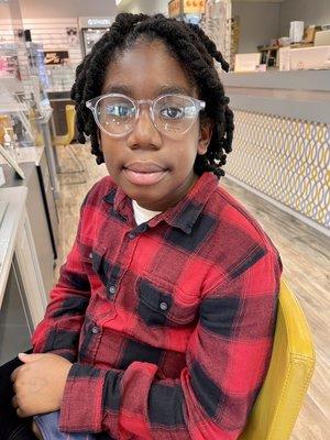 My son's first pair of glasses from Eyelusions.